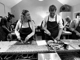 A couple cooking at The Recipe.